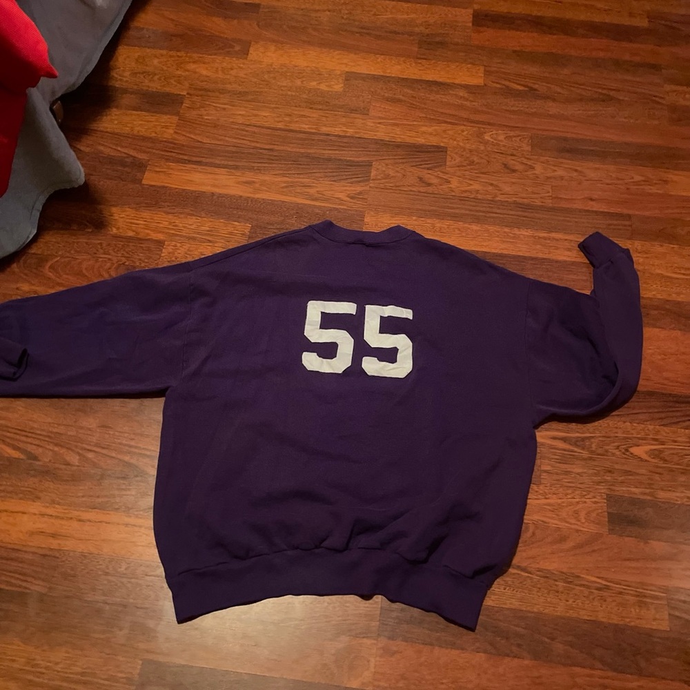 long sleeve prurple pull over crewneck with logan and 55